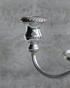 Detailed view of fluted candle cup on vintage Italian three arm candelabra