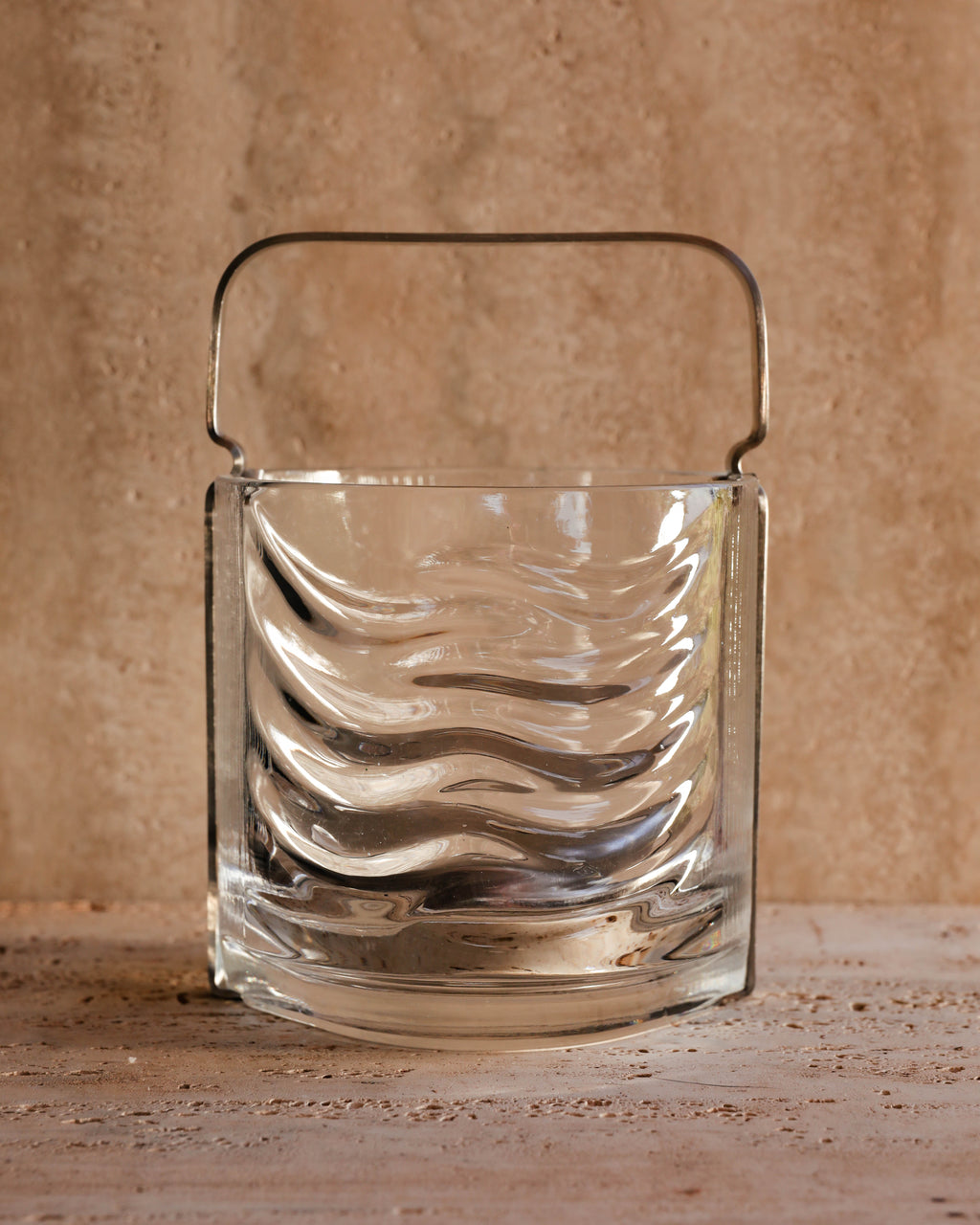 Front view of 1970s Fabio Frontini Azteca ice bucket for Arnolfo di Cambio — sculptural textured glass with chrome handle, Italian design