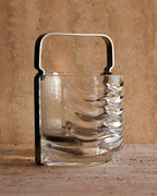 Side angle of vintage Fabio Frontini ice bucket for Arnolfo di Cambio — thick sculptural glass with chrome detail, 1970s Italy