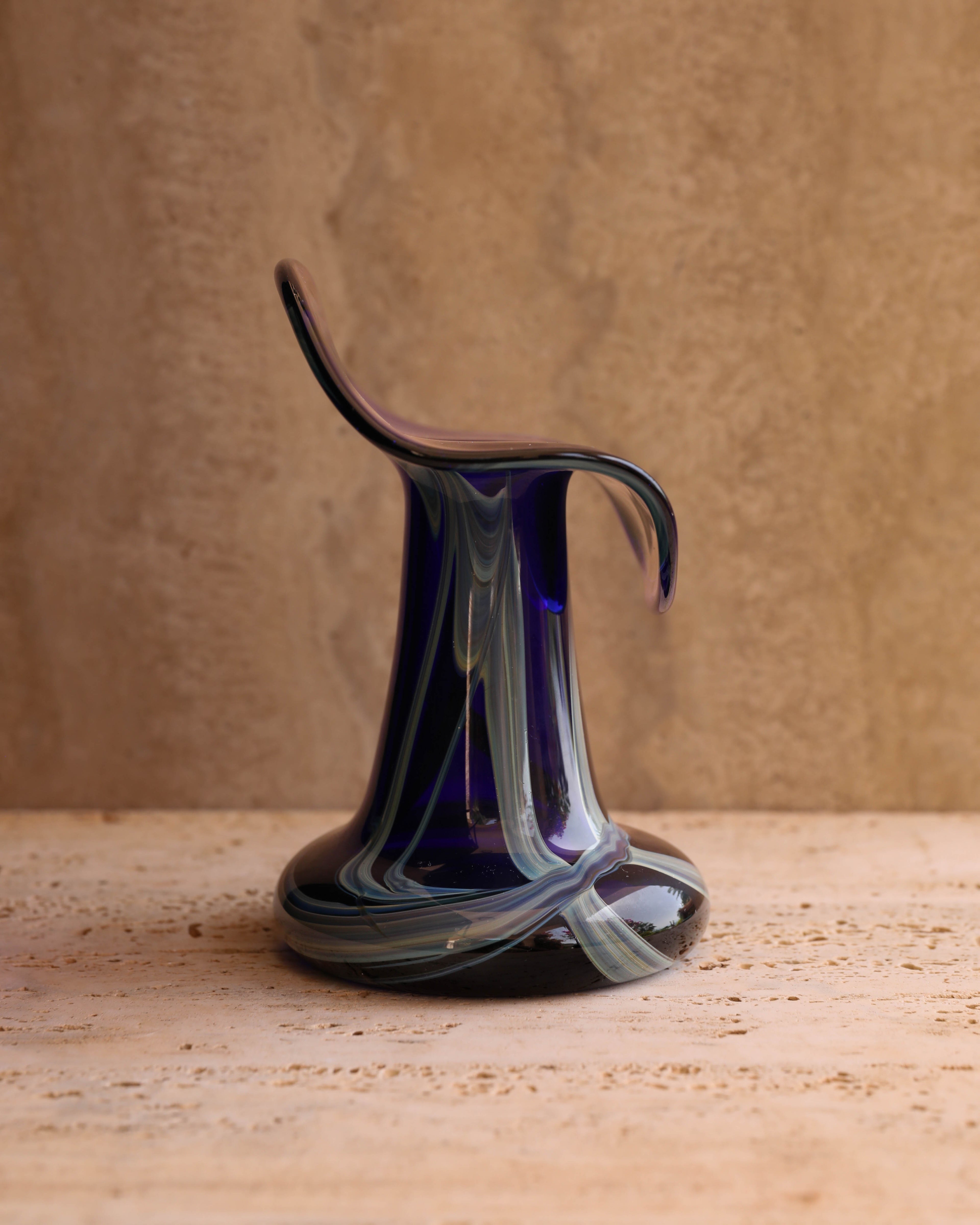 Side profile of hand-blown Marta Marzotto vase showing curved organic form