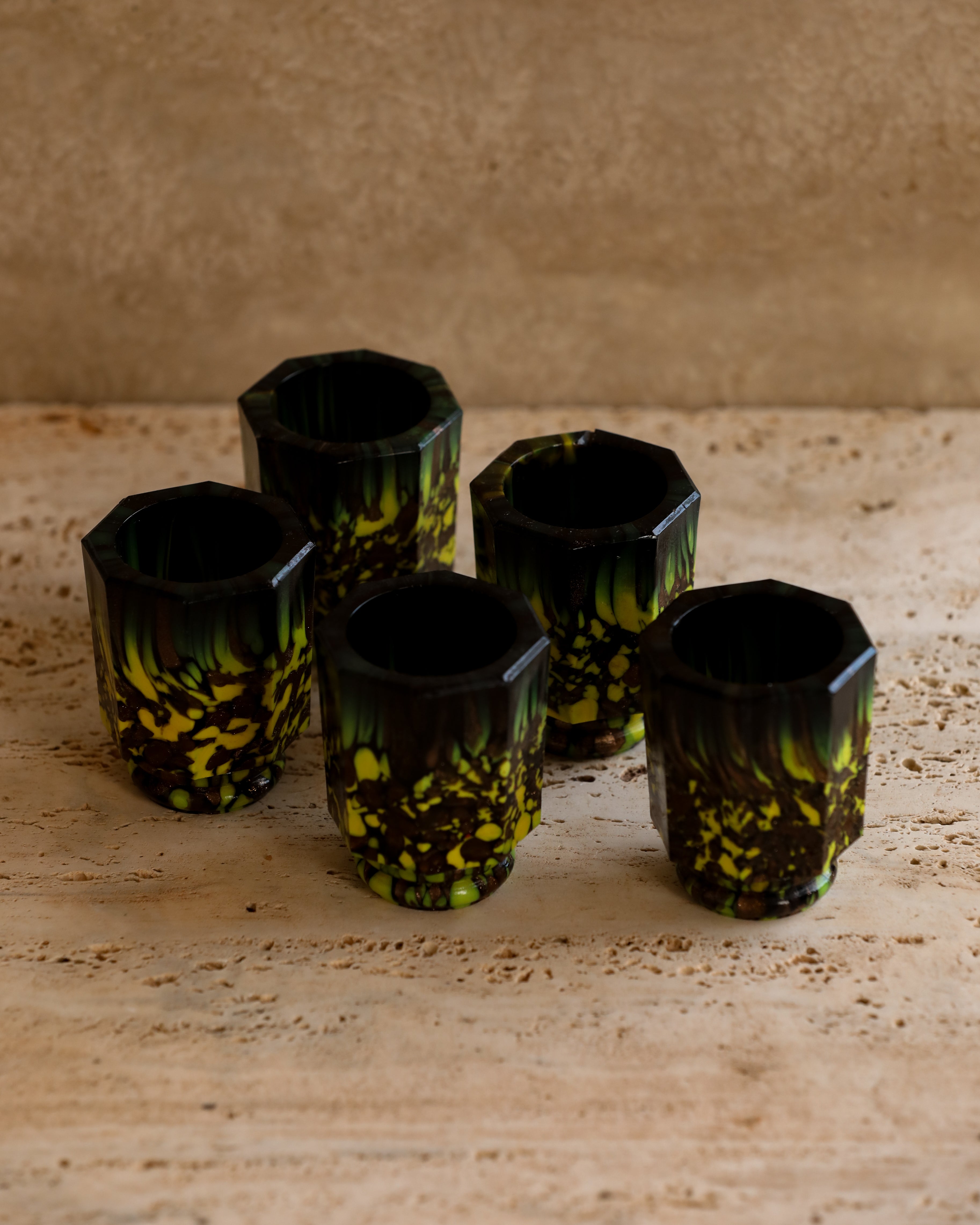 Set of five vintage Murano glass shot glasses, mold-blown and hand-finished in green and amber tones — collectible Italian barware set