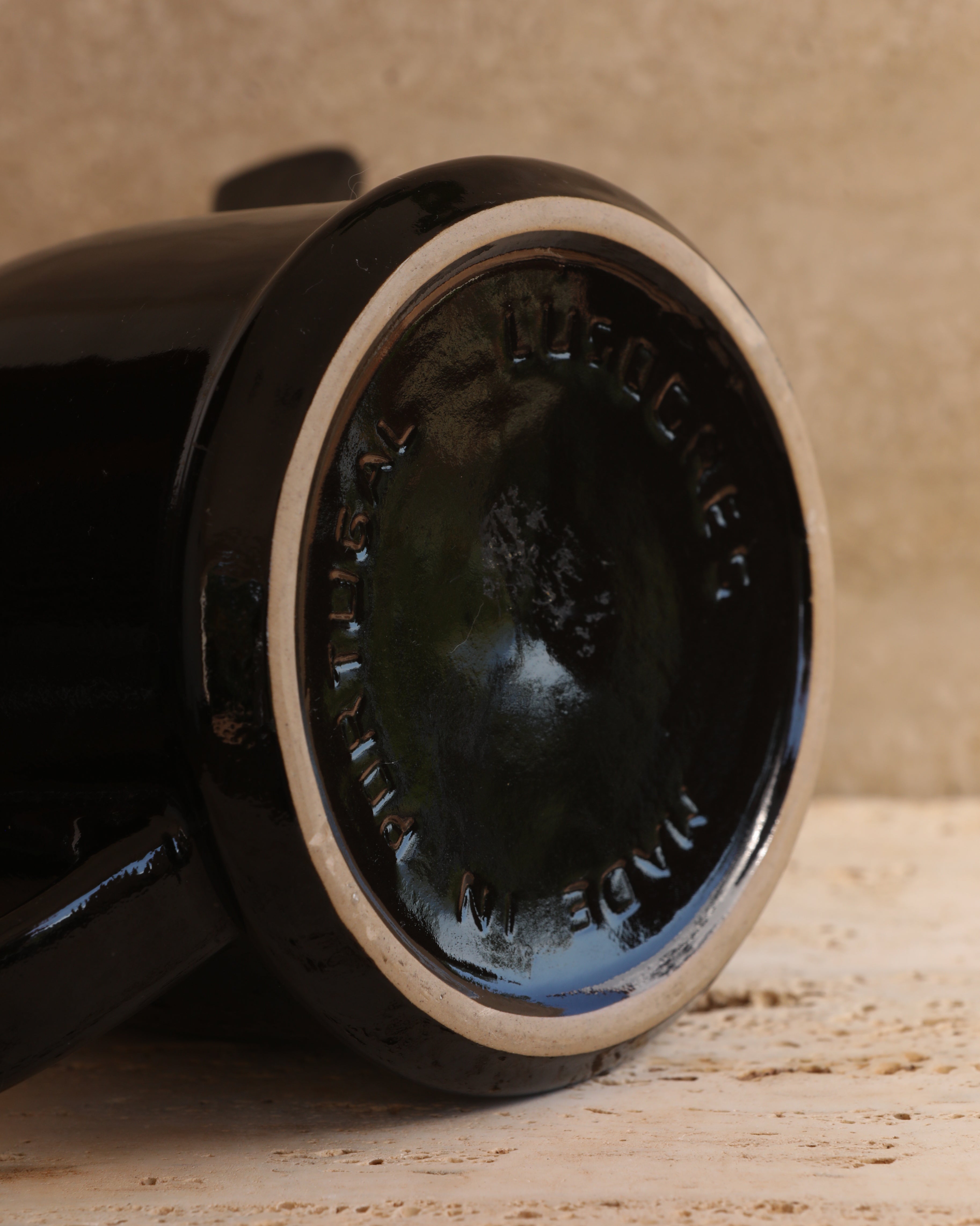 Bottom stamp “Made in Portugal” on vintage black ceramic kettle