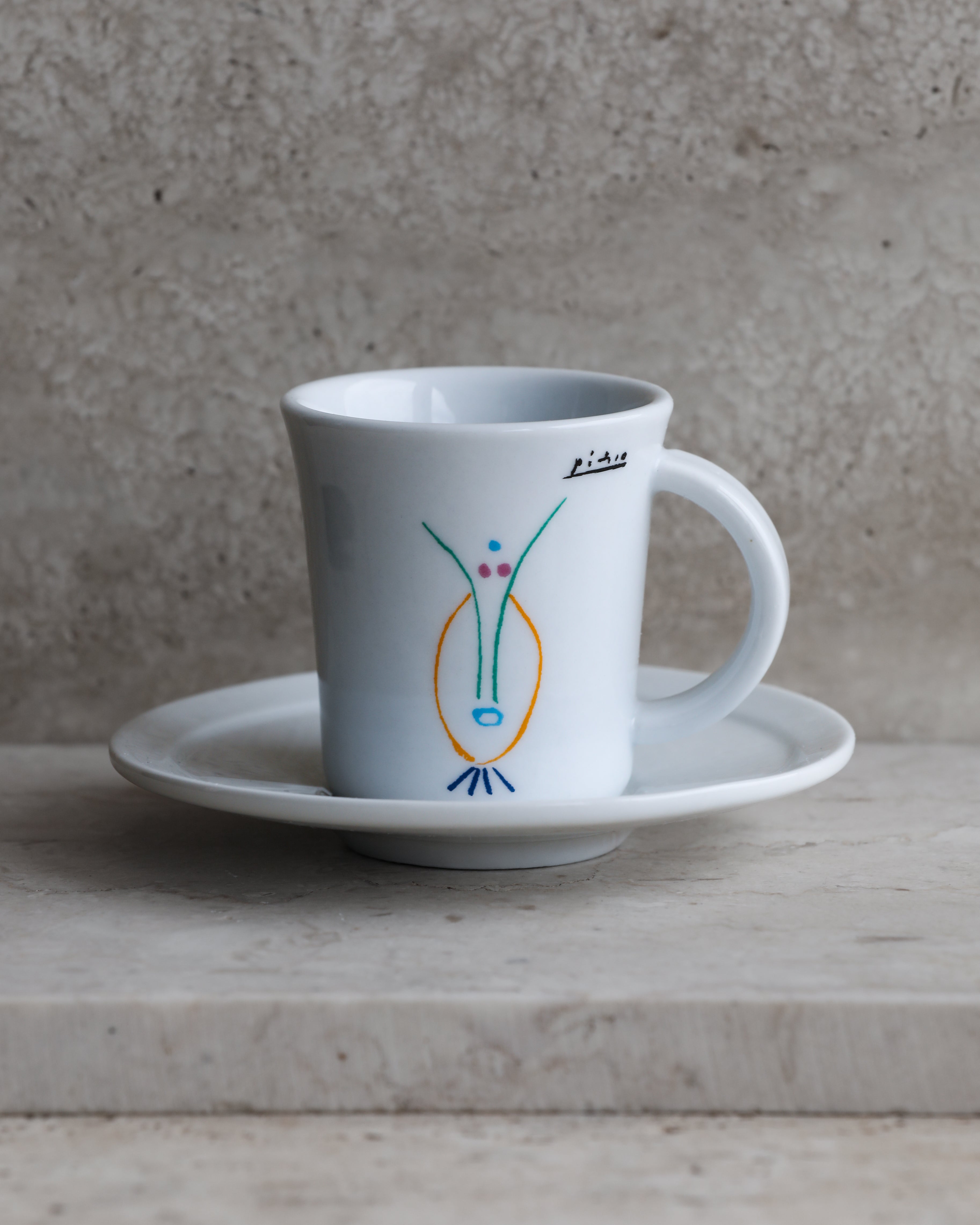Vintage Picasso espresso cup with abstract face line drawing and saucer