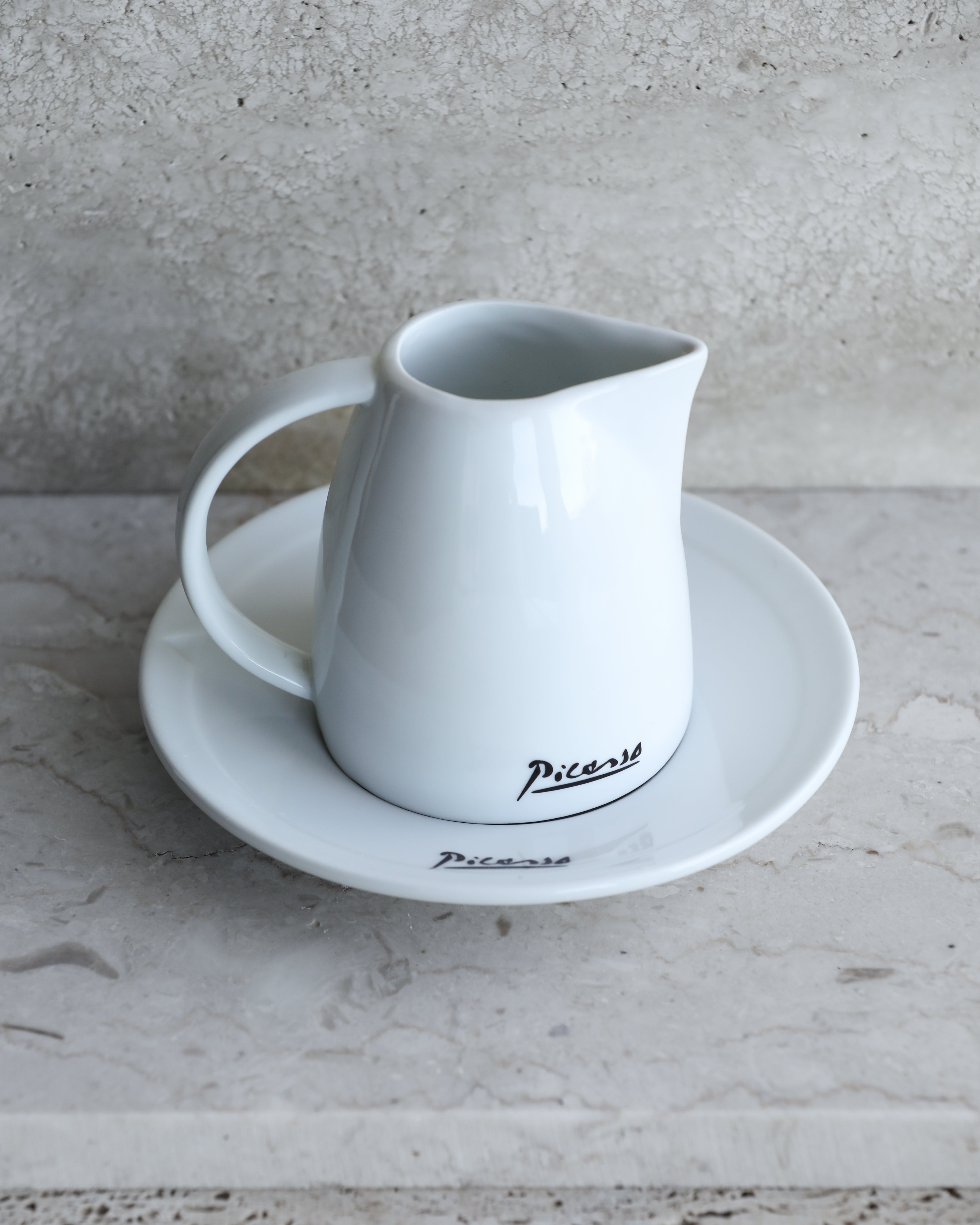 Rear view of Tognana milk jug showing sculptural handle and pouring spout