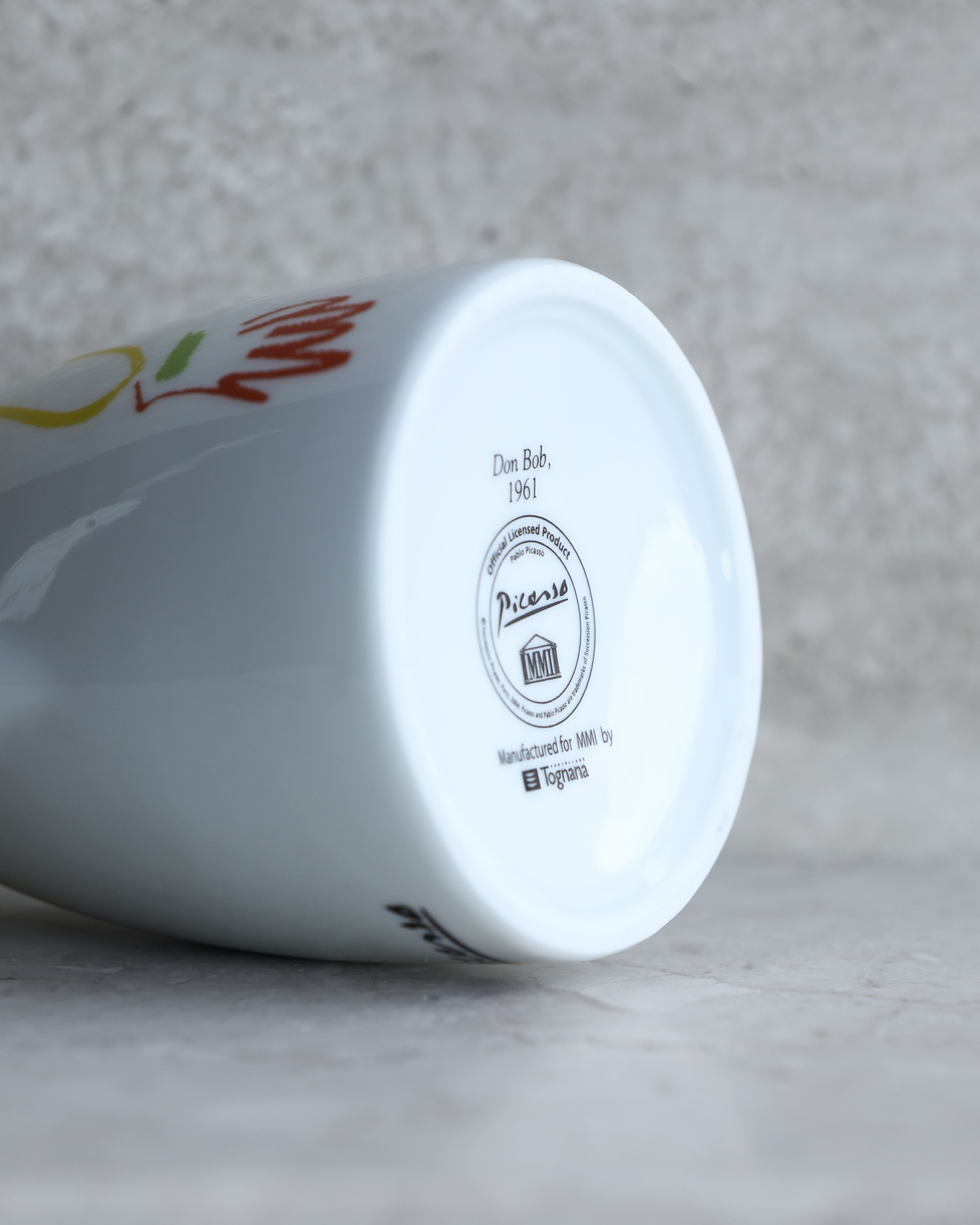 Underside mark showing official Picasso license, MMI seal, and Tognana manufacture